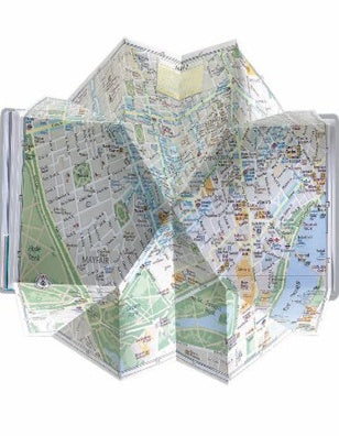 Folded map with city layout on a white background